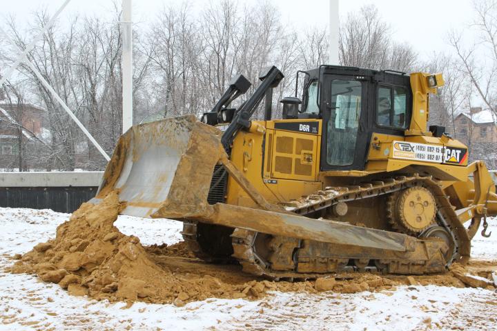 Земляные работы-компания Техоптимум.
Бульдозер CAT D6R XL компании Техоптимум.
