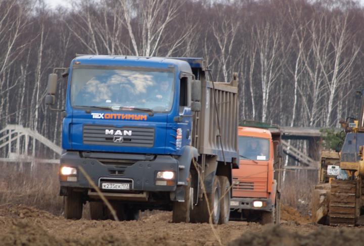 Компания Техоптимум-разработка котлована и вывоз грунта.
Самосвал MAN TGA 33.360 компании Техоптимум.